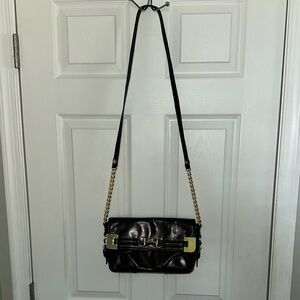 ANTONIO MELANI Black and Gold Crossbody Bag with Glossy Finish